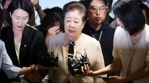 Disputed Religious Head Denies Gift-giving Accusations Involving Ex-South Korea President's Wife